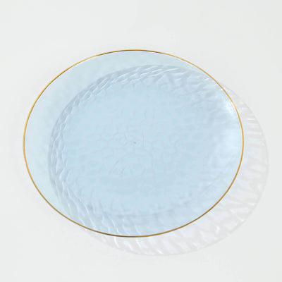 Light blue decorative plate with a textured surface and gold rim