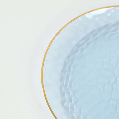 Light blue textured plate with a gold rim