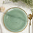 Mint green plate with a gold rim on a marble surface.