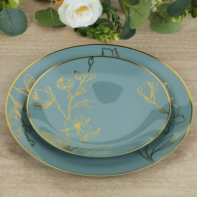 Elegant floral design dinnerware set in teal with gold accents.