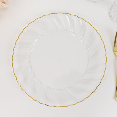 Clear decorative plate with a gold scalloped edge