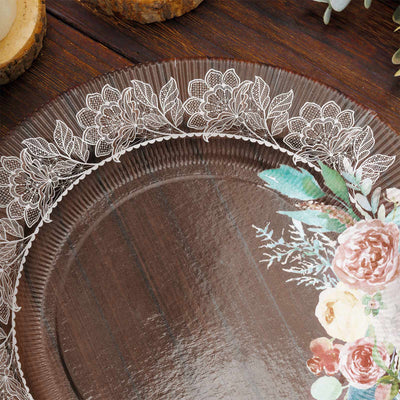 Floral design plastic serving platter on a wooden table.