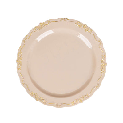 Elegant beige plate with ornate gold trim on a white background.
