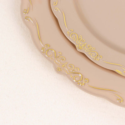 Elegant beige plates with ornate gold detailing.