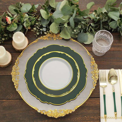 Elegant green and gold decorative plates on a rustic wooden table.