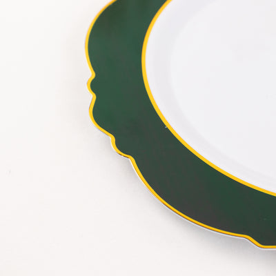 Green and white decorative plate with a scalloped edge.