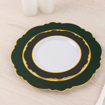 Elegant green and black decorative plates stacked on a wooden table.