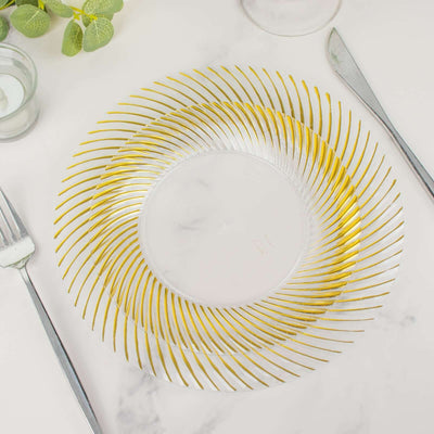 Gold striped decorative plate on marble table setting.