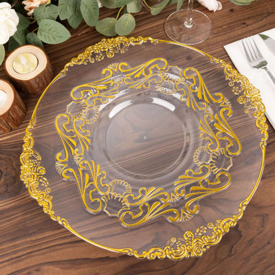 Elegant clear plate with intricate gold floral design on a wooden table.