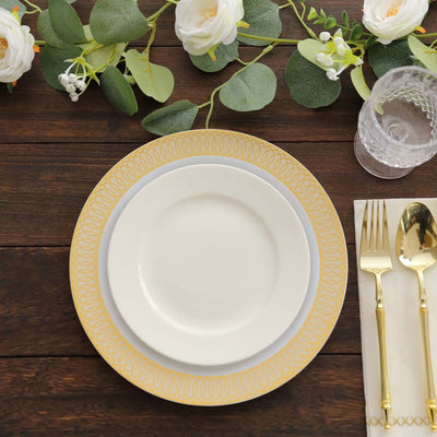 Elegant white dinner plate with golden rim, styled on a wooden table.