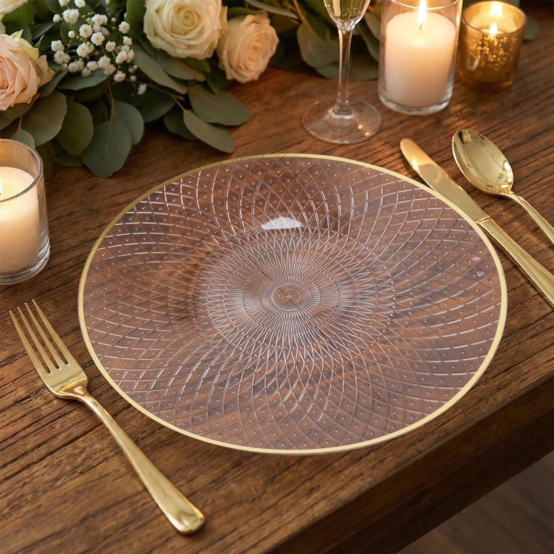 Elegant clear plate with geometric pattern and gold rim, set on a wooden table.
