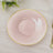 Pink decorative plate with golden rim and textured design.