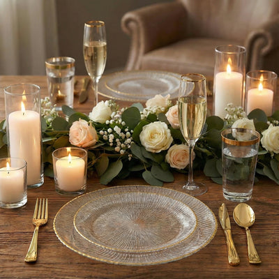 Elegant dining table set with candles and flowers for a romantic occasion.