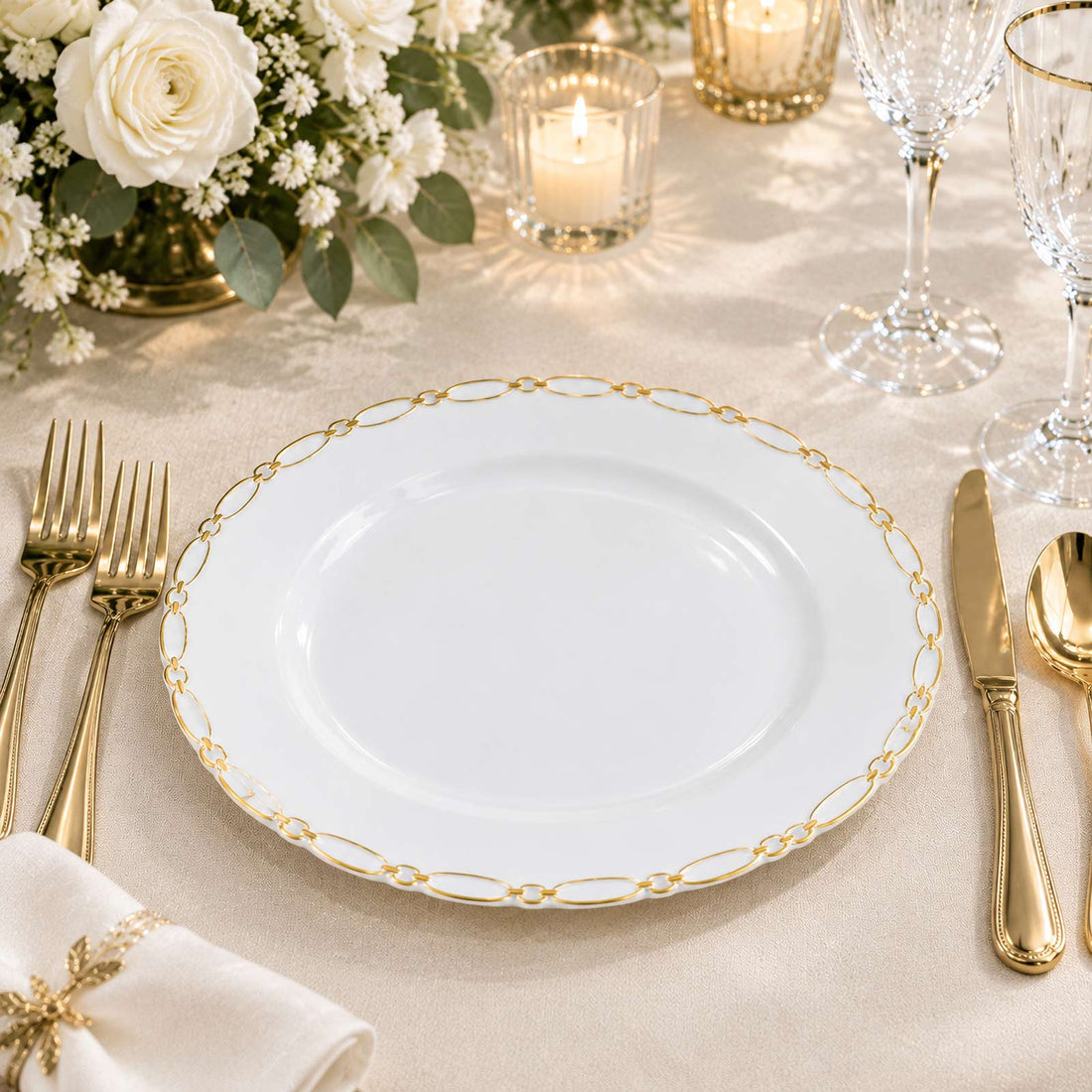 Elegant white and gold dinner plate on luxury formal table setting