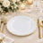 Elegant white and gold dinner plate on luxury formal table setting