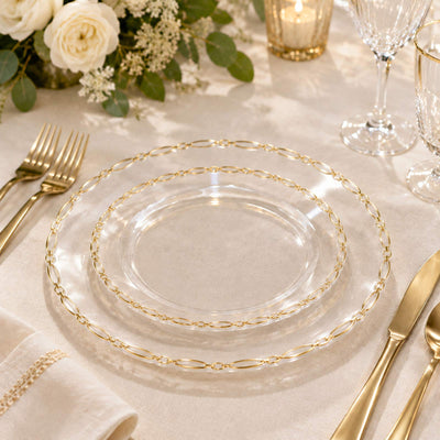 Elegant gold-rimmed clear glass plate on luxury table setting