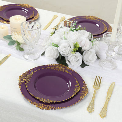 Elegant purple dinner plates with gold trim on a beautifully set table.