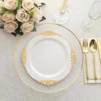 Elegant dining set with gold-accented plate and floral centerpiece.