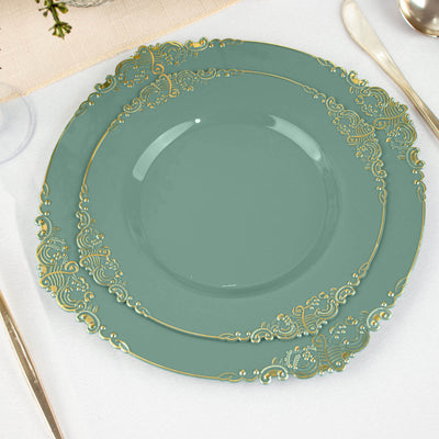 Elegant teal plates with intricate gold detailing, stacked on a table setting.