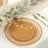Amber glass charger plate with beaded rim on a table setting.