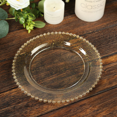Elegant glass plate with a beaded edge and gold glitter accents.