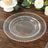 Clear decorative plates with beaded edges on a wooden table.
