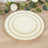 Elegant cream plates with gold bead trim in three sizes on a wooden table.