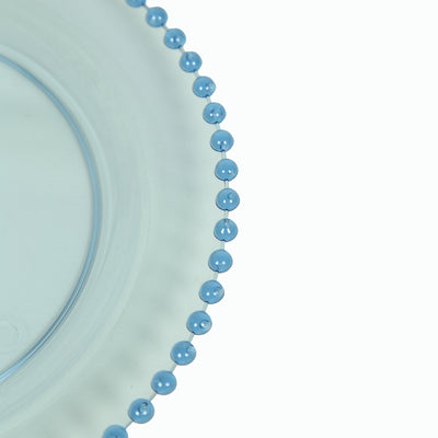 Blue beaded glass plate on a white background.