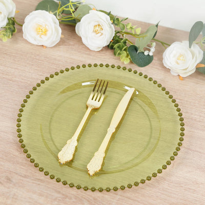 Elegant green plate with gold cutlery, perfect for dining settings.