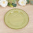 Green decorative plate with beaded rim on wooden surface.