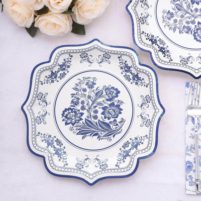 Ornate blue floral design plate on a white background.