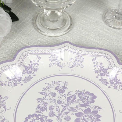 Decorative lavender floral plate with elegant design on a textured surface.