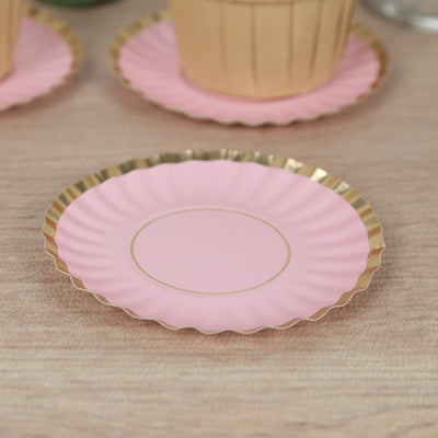 Pink decorative plate with gold rim, perfect for parties or events.