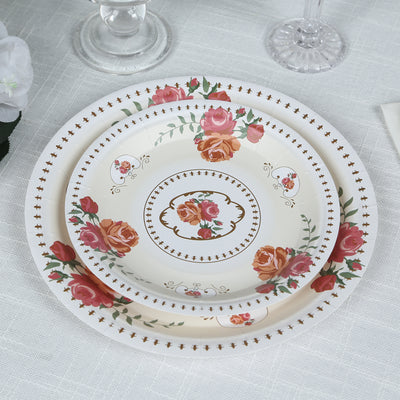 Floral decorative plates stacked on a table.