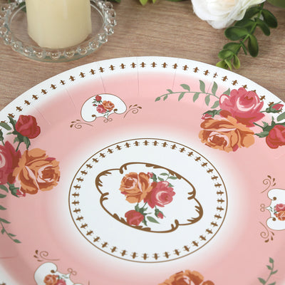 Floral decorative plate with pink background and rose designs.