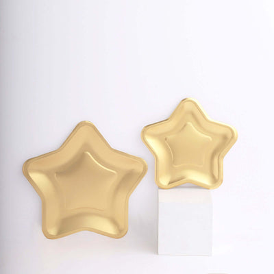 Gold star-shaped serving plates in two sizes on a white background.