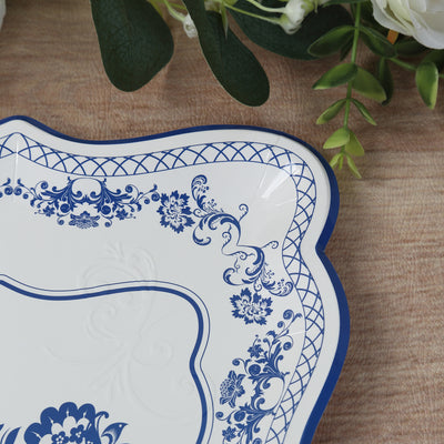 Decorative blue and white patterned plate on a textured surface.