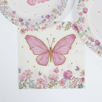 Decorative butterfly napkin with floral design on a white background.