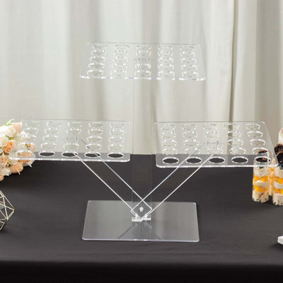 Acrylic display stand with three tiers for showcasing items.