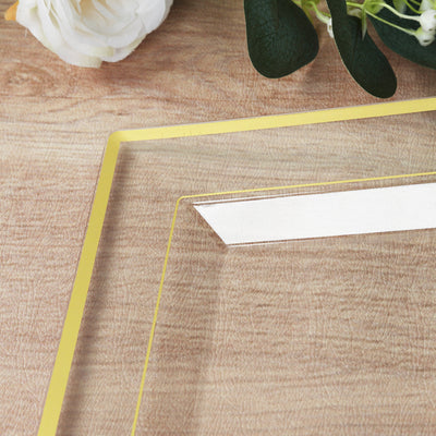 Acrylic frame with yellow edges on a wooden surface.