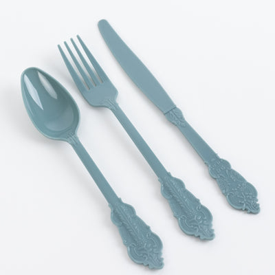 Teal plastic cutlery set including a spoon, fork, and knife