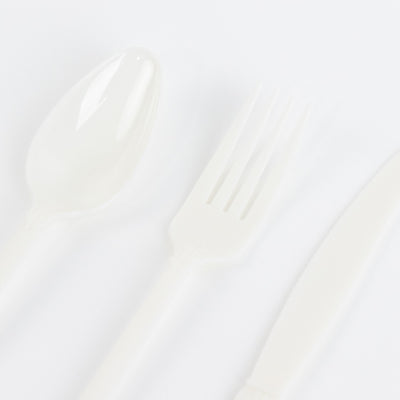 White plastic cutlery set including spoon, fork, and knife