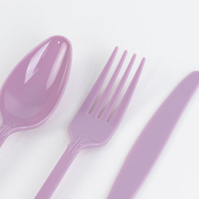 Purple plastic cutlery set including spoon, fork, and knife
