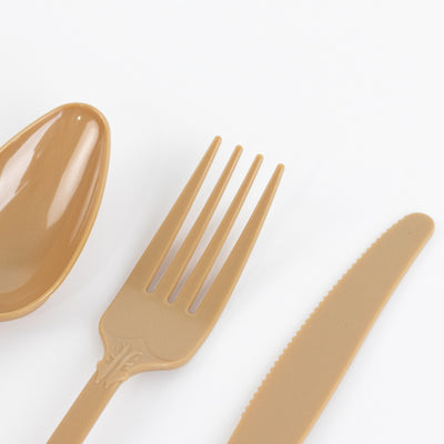 Brown plastic cutlery set including spoon, fork, and knife