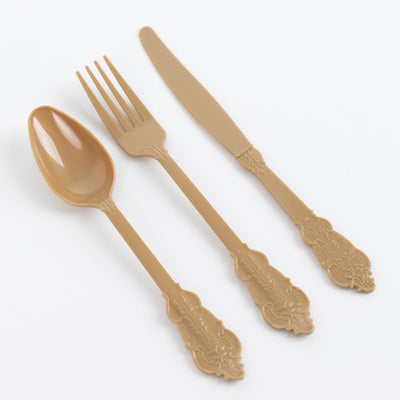 Elegant beige plastic cutlery set: spoon, fork, and knife.