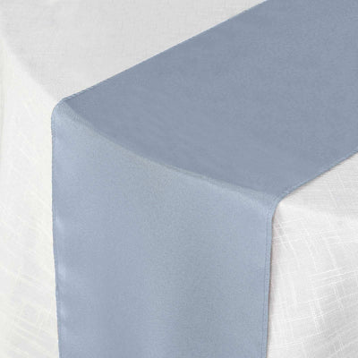 Light gray table runner on a white tablecloth.