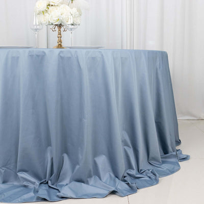 Blue tablecloth draped elegantly on a table in a styled setting.