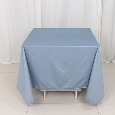 Blue tablecloth draped over a table, enhancing any dining setting.