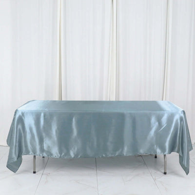 Light blue satin tablecloth draped over a table