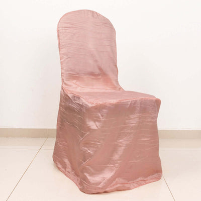 Pink satin chair cover on a plain white backdrop